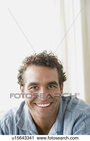 Portrait of smiling mature man View Large Photo Image Stock Image - Portrait of smiling mature man. Fotosearch