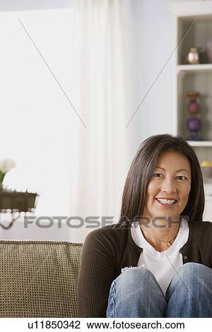 Portrait of smiling mature woman View Large Photo Image Stock Image - Portrait of smiling mature woman. Fotosearch