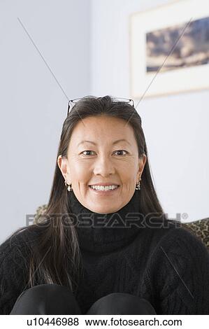 Portrait of smiling mature woman View Large Photo Image Stock Photo - Portrait of smiling mature woman. Fotosearch