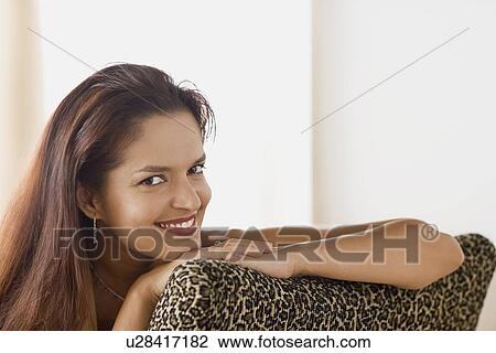 Portrait of smiling mid adult woman View Large Photo Image Stock Image - Portrait of smiling mid adult woman. Fotosearch