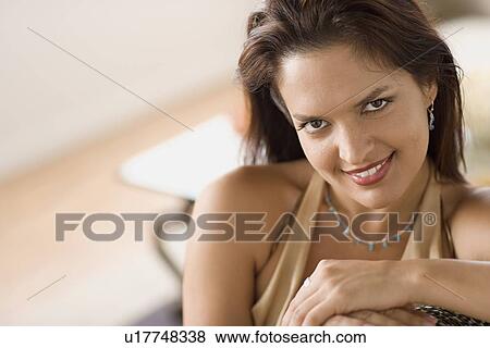 Portrait of smiling mid adult woman View Large Photo Image Stock Photo - Portrait of smiling mid adult woman. Fotosearch
