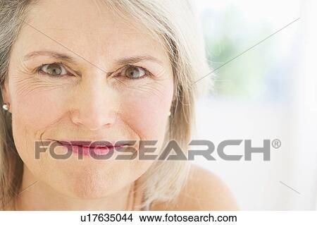 Portrait of smiling senior woman View Large Photo Image Picture - Portrait of smiling senior woman. Fotosearch