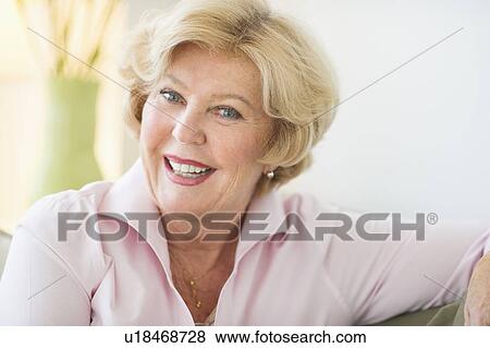 Stock Photo - Portrait of smiling senior woman. Fotosearch
