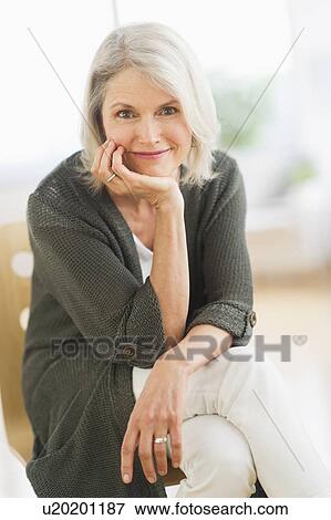 Portrait of smiling senior woman View Large Photo Image Stock Photo - Portrait of smiling senior woman. Fotosearch