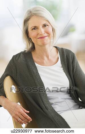 Portrait of smiling senior woman View Large Photo Image Stock Photo - Portrait of smiling senior woman. Fotosearch