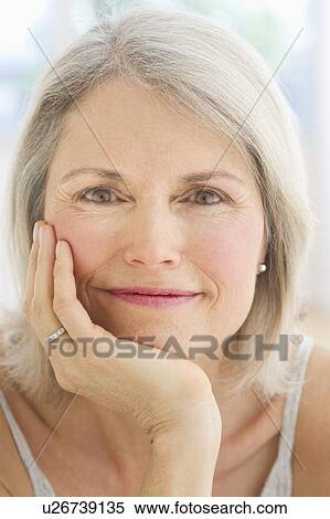 Portrait of smiling senior woman View Large Photo Image Stock Photography - Portrait of smiling senior woman . Fotosearch