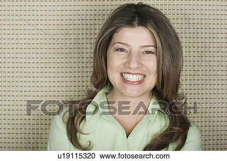 Stock Image - Portrait of smiling woman. Fotosearch