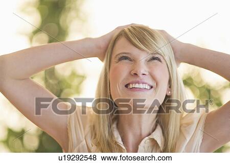 Portrait of smiling woman View Large Photo Image Stock Photo - Portrait of smiling woman. Fotosearch