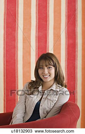 Portrait of smiling young woman View Large Photo Image Stock Image - Portrait of smiling young woman. Fotosearch