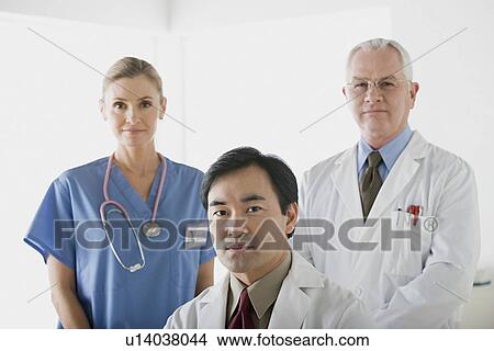 Portrait of three doctors View Large Photo Image Picture - Portrait of three doctors. Fotosearch
