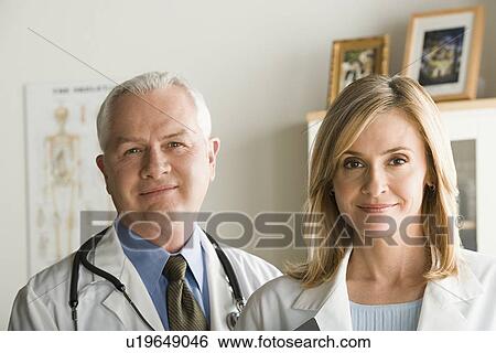 Portrait of two doctors View Large Photo Image Stock Photograph - Portrait of two doctors. Fotosearch