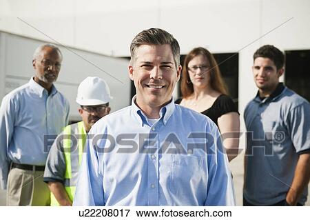 Portrait of warehouse workers and manager View Large Photo Image Stock Photo - Portrait of warehouse workers and manager. Fotosearch