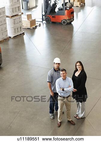 Stock Image - Portrait of warehouse workers. Fotosearch