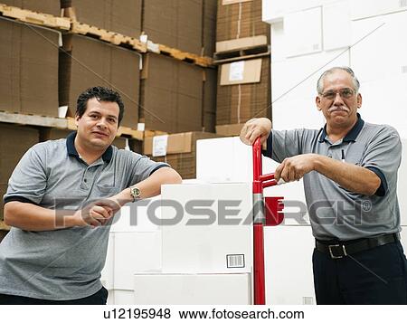 Stock Photo - Portrait of warehouse workers. Fotosearch