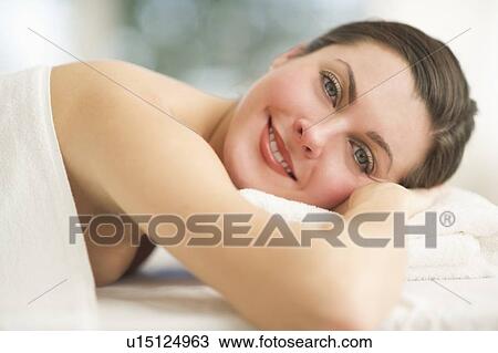 Portrait of woman relaxing in spa View Large Photo Image Stock Image - Portrait of woman relaxing in spa. Fotosearch