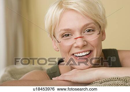 Stock Photograph - Portrait of woman smiling. Fotosearch