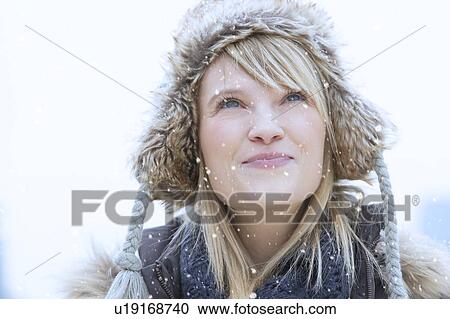 Portrait of woman wearing knit hat smiling View Large Photo Image Stock Image - Portrait of woman wearing knit hat smiling. Fotosearch