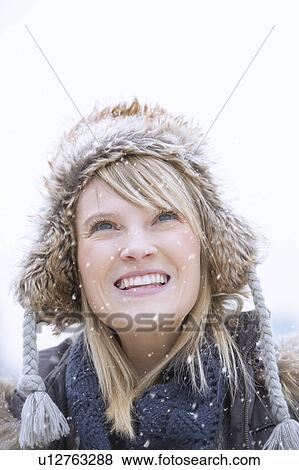 Portrait of woman wearing knit hat smiling View Large Photo Image Stock Photo - Portrait of woman wearing knit hat smiling. Fotosearch