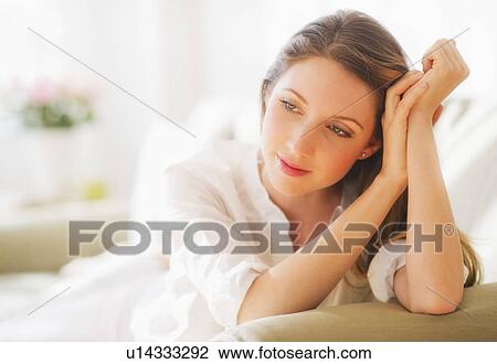 Stock Image - Portrait of young woman . Fotosearch