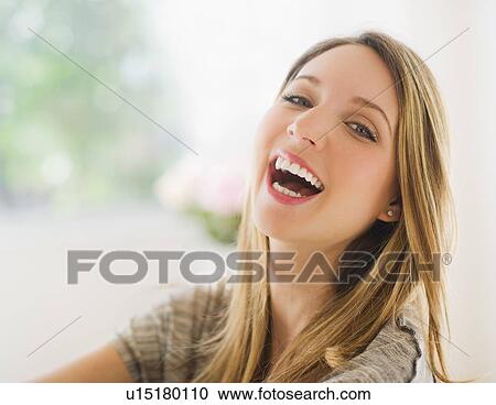 Stock Image - Portrait of young woman. Fotosearch