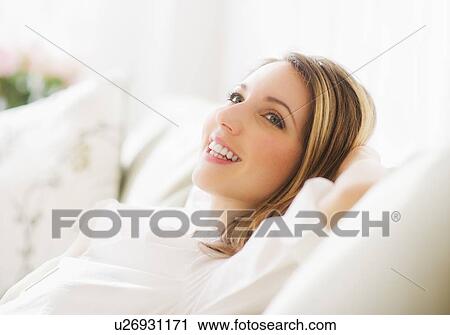Stock Image - Portrait of young woman . Fotosearch