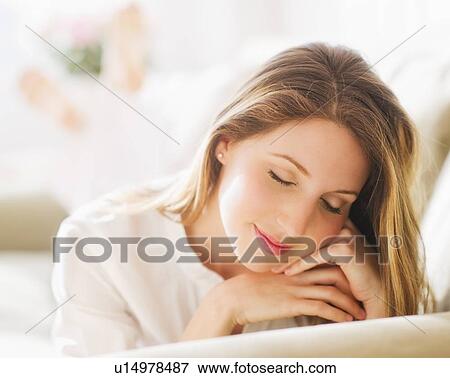 Portrait of young woman View Large Photo Image Stock Photo - Portrait of young woman . Fotosearch