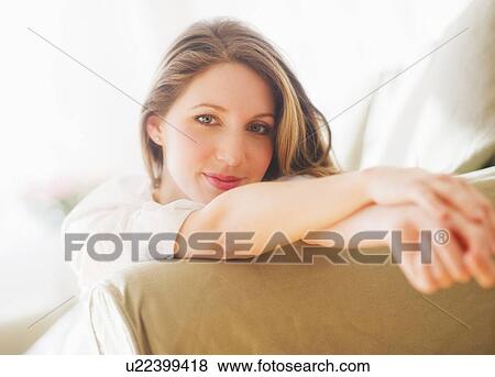 Portrait of young woman View Large Photo Image Stock Photo - Portrait of young woman . Fotosearch
