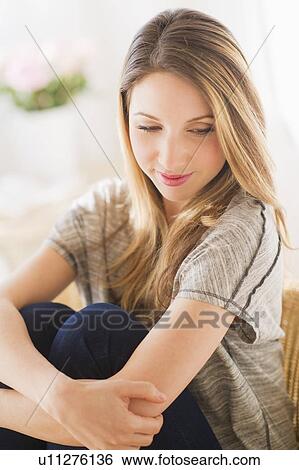 Stock Photograph - Portrait of young woman. Fotosearch