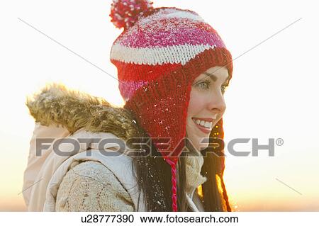 Portrait of young woman wearing knit hat View Large Photo Image Stock Image - Portrait of young woman wearing knit hat. Fotosearch