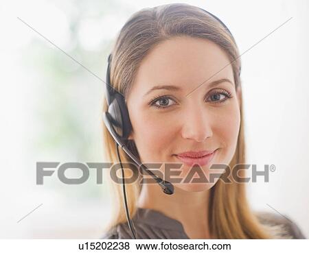 Portrait of young woman with headphones View Large Photo Image Stock Photo - Portrait of young woman with headphones. Fotosearch
