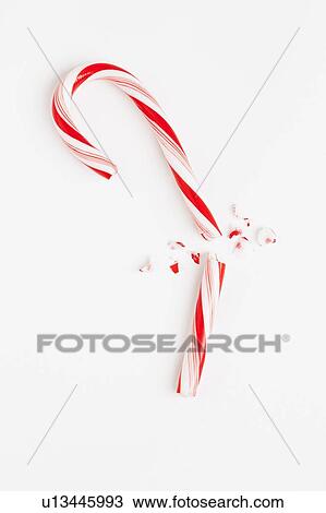 Red and white broken candy cane, studio shot View Large Photo Image Stock Image - Red and white broken candy cane, studio shot. Fotosearch
