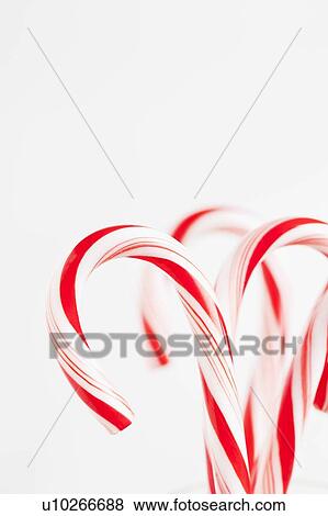 Red and white candy canes, studio shot View Large Photo Image Stock Photo - Red and white candy canes, studio shot. Fotosearch