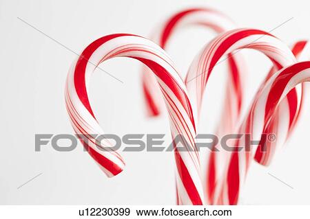 Red and white candy canes, studio shot View Large Photo Image Stock Photo - Red and white candy canes, studio shot. Fotosearch
