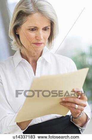 Senior businesswoman working View Large Photo Image Stock Image - Senior businesswoman working. Fotosearch