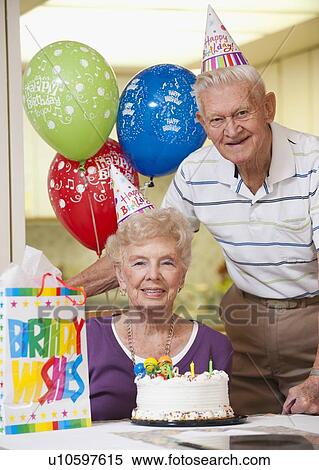 Senior couple celebrating birthday View Large Photo Image Stock Photography - Senior couple celebrating birthday. Fotosearch
