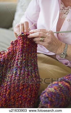 Senior woman knitting, close-up View Large Photo Image Stock Image - Senior woman knitting, close-up. Fotosearch