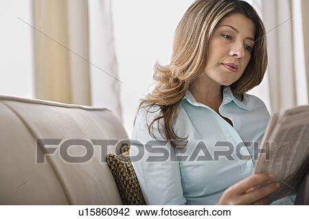 Senior woman reading newspaper View Large Photo Image Stock Image - Senior woman reading newspaper. Fotosearch