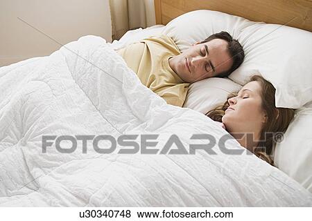 Sleeping couple View Large Photo Image Stock Photo - Sleeping couple. Fotosearch