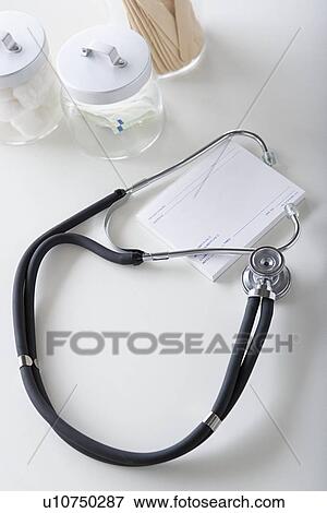 Stethoscope on desk View Large Photo Image Stock Photo - Stethoscope on desk. Fotosearch