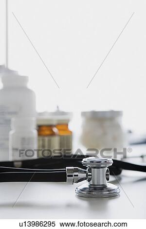 Stock Photography - Stethoscope on desk. Fotosearch