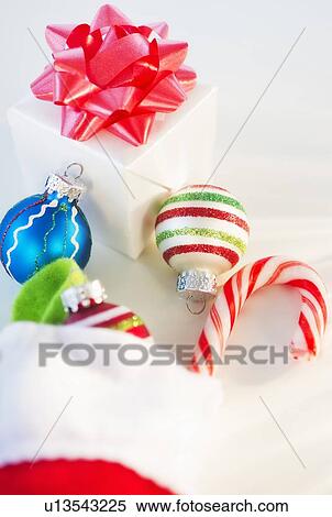 Stock Photography - Still life with Christmas stocking and baubles. Fotosearch