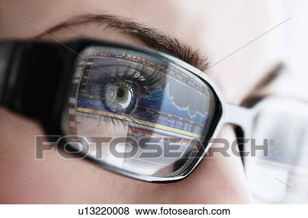 Studio close-up of woman wearing eyeglasses View Large Photo Image Stock Photo - Studio close-up of woman wearing eyeglasses. Fotosearch