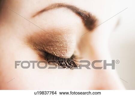 Picture - Studio close-up of woman's eye. Fotosearch