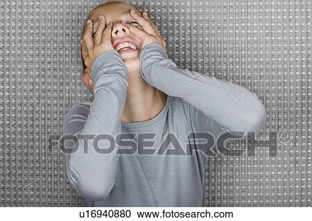 Studio portrait of girl (12-13) with head in hands View Large Photo Image Stock Image - Studio portrait of girl (12-13) with head in hands. Fotosearch
