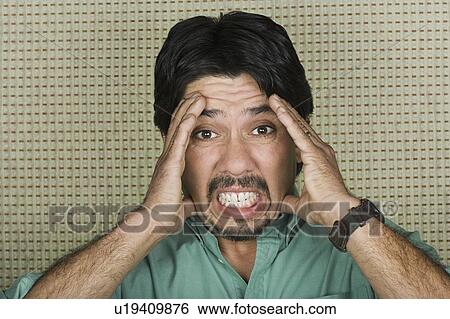 Studio portrait of mature man with head in hands View Large Photo Image Stock Photograph - Studio portrait of mature man with head in hands. Fotosearch