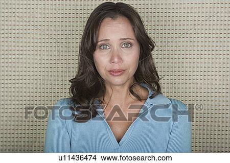Picture - Studio portrait of mature woman. Fotosearch