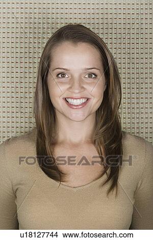 Studio portrait of mature woman smiling View Large Photo Image Picture - Studio portrait of mature woman smiling. Fotosearch