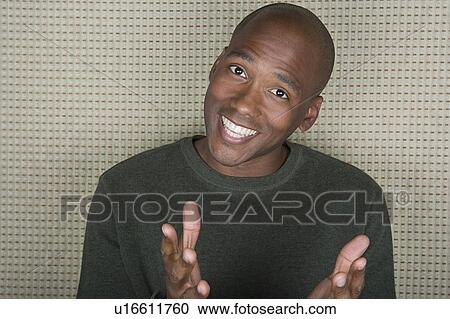 Studio portrait of mid adult man smiling View Large Photo Image Stock Image - Studio portrait of mid adult man smiling. Fotosearch