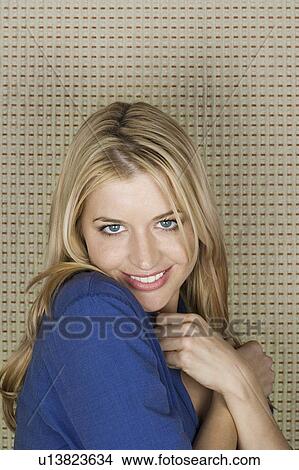 Studio portrait of mid adult woman smiling View Large Photo Image Picture - Studio portrait of mid adult woman smiling. Fotosearch