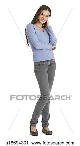 Stock Image - Studio portrait of mid adult woman. Fotosearch